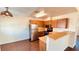 Features of the kitchen include light wood cabinets, a stainless steel refrigerator and modern appliances at 2685 Bryandouglas Dr, Las Vegas, NV 89121
