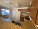 Efficient kitchen with wooden cabinets, double sink, and breakfast bar area at 2685 Bryandouglas Dr, Las Vegas, NV 89121