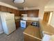 Kitchen area featuring standard appliances and a tile floor at 2685 Bryandouglas Dr, Las Vegas, NV 89121