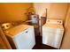 Bright laundry room featuring a washer, dryer, and a water heater at 2685 Bryandouglas Dr, Las Vegas, NV 89121