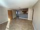 Open living room showcasing tile floors and an eat-in kitchen at 2685 Bryandouglas Dr, Las Vegas, NV 89121