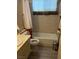 Compact bathroom featuring a bathtub and shower combo with modern fixtures at 2724 Natalie Ave, Las Vegas, NV 89121
