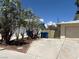 Wide driveway provides ample parking surrounded by mature trees and desert landscaping at 2724 Natalie Ave, Las Vegas, NV 89121
