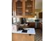 Functional kitchen with stainless steel appliances, traditional cabinets and ample counter space at 2724 Natalie Ave, Las Vegas, NV 89121