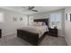 Bedroom featuring carpet, ceiling fan, plantation shutters, and tasteful furnishings at 2827 Turnstone Ridge St, Henderson, NV 89044