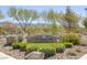 Aventura Park sign with lush landscaping and beautiful desert trees at 2827 Turnstone Ridge St, Henderson, NV 89044