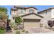 Charming two-story home with a brick driveway and well-maintained landscaping at 2827 Turnstone Ridge St, Henderson, NV 89044