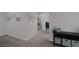 Hallway view features neutral-toned walls, carpeted floors, and access to other rooms at 2827 Turnstone Ridge St, Henderson, NV 89044