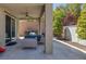 Outdoor patio with a ceiling fan, BBQ, and seating area at 2827 Turnstone Ridge St, Henderson, NV 89044