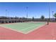 A well-maintained tennis court provides an opportunity for recreation at 2827 Turnstone Ridge St, Henderson, NV 89044