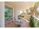 Inviting balcony with tile flooring, seating, and vibrant greenery, providing a serene outdoor space at 2857 Paradise Rd # 305, Las Vegas, NV 89109