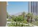 Palm trees and mountain views from your balcony at 2857 Paradise Rd # 305, Las Vegas, NV 89109