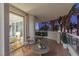 Balcony with lounge chairs overlooking palms and city lights offers a private outdoor space at 2857 Paradise Rd # 305, Las Vegas, NV 89109