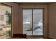View into a bedroom from the balcony, featuring white decor and contemporary furniture at 2857 Paradise Rd # 305, Las Vegas, NV 89109