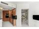 Spacious kitchen with wood cabinetry, stainless steel appliances and access to the dining room at 2857 Paradise Rd # 305, Las Vegas, NV 89109