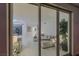 Living room featuring white decor, modern art, and a comfortable seating area, viewed from the balcony at 2857 Paradise Rd # 305, Las Vegas, NV 89109
