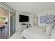 Bright main bedroom with large sliding glass door and balcony access at 2857 Paradise Rd # 305, Las Vegas, NV 89109