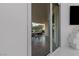 View of outdoor patio space accessible through sliding glass doors at 2857 Paradise Rd # 305, Las Vegas, NV 89109