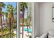 Views of the pool with palm trees and luxury resort at 2857 Paradise Rd # 305, Las Vegas, NV 89109