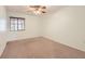 Light and airy bedroom with carpet, a ceiling fan, and a window at 3104 Archwood Way, Las Vegas, NV 89134