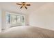 Bright bedroom with neutral carpet, a bay window, and ample natural light at 3104 Archwood Way, Las Vegas, NV 89134