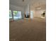 Spacious living room featuring a fireplace and sliding glass doors to the backyard at 3104 Archwood Way, Las Vegas, NV 89134