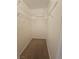 Walk-in closet with standard shelving and carpeted floor at 3104 Archwood Way, Las Vegas, NV 89134