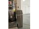 Gray Rheem water heater with white tanks and access door at 3104 Archwood Way, Las Vegas, NV 89134