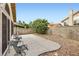 Backyard featuring patio, desert landscaping, and block wall at 314 Abbington St, Henderson, NV 89074