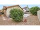 Backyard featuring desert landscaping and tile roofs at 314 Abbington St, Henderson, NV 89074