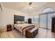 Bedroom featuring vaulted ceiling, natural light, and tile floors at 314 Abbington St, Henderson, NV 89074