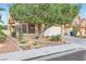 Charming single-story home with a well-maintained yard and a two-car garage at 314 Abbington St, Henderson, NV 89074