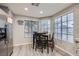 Kitchen features stainless steel refrigerator and breakfast nook at 314 Abbington St, Henderson, NV 89074