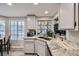 Kitchen features granite counters and a stained glass window at 314 Abbington St, Henderson, NV 89074