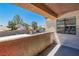 Exterior view of a private balcony with a view of surrounding homes and landscaping at 3151 Soaring Gulls Dr # 2136, Las Vegas, NV 89128