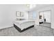 Bright bedroom features carpet, and a closet with mirrored doors, creating a serene retreat at 3151 Soaring Gulls Dr # 2136, Las Vegas, NV 89128