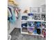 Walk-in closet with storage units, clothing racks, shelving, and a carpeted floor at 3151 Soaring Gulls Dr # 2136, Las Vegas, NV 89128