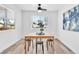 Cozy dining room with natural light, a modern ceiling fan, and a view of the outdoors at 3151 Soaring Gulls Dr # 2136, Las Vegas, NV 89128