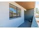 Exterior view of a unit with textured facade, window and walkway at 3151 Soaring Gulls Dr # 2136, Las Vegas, NV 89128
