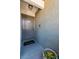 Entrance to the unit, with a stylish door, a welcome mat, and a potted plant at 3151 Soaring Gulls Dr # 2136, Las Vegas, NV 89128