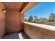 Outdoor patio with privacy wall and door, offering a secluded outdoor space at 3151 Soaring Gulls Dr # 2136, Las Vegas, NV 89128