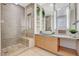 Modern bathroom featuring a glass-enclosed shower, double vanity, and stylish fixtures and decorations at 3722 Las Vegas Blvd # 2204, Las Vegas, NV 89158