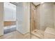 Spacious bathroom with a tiled shower, glass door, and modern fixtures and vanity at 3722 Las Vegas Blvd # 2204, Las Vegas, NV 89158