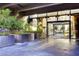 Contemporary building entrance with metal planters, glass doors, and modern design at 3722 Las Vegas Blvd # 2204, Las Vegas, NV 89158