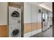 Laundry area featuring stacked washer and dryer, and functional storage space at 3722 Las Vegas Blvd # 2204, Las Vegas, NV 89158