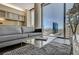 Modern living room showcasing a comfortable sofa, a city view, and stylish contemporary furniture at 3722 Las Vegas Blvd # 2204, Las Vegas, NV 89158
