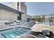 Rooftop pool area with a hot tub, lounge seating, and modern design elements at 3722 Las Vegas Blvd # 2204, Las Vegas, NV 89158
