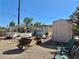 Wide backyard featuring a shed, gravel, and outdoor features for relaxation and hobbies at 4420 Avondale Ave, Las Vegas, NV 89121