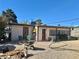 This cozy home offers a spacious gravel backyard, ideal for entertaining, with a small patio area at 4420 Avondale Ave, Las Vegas, NV 89121