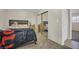 Spacious bedroom with a large mirrored closet, comfortable carpet, and warm ambiance at 45 Prince Ln, Las Vegas, NV 89110
